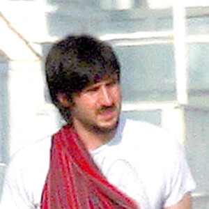 Courteney Cox et David Arquette en 2004 lors d'une promenade à la plage avec leurs chiens juste après la naissance de leur fille Coco.