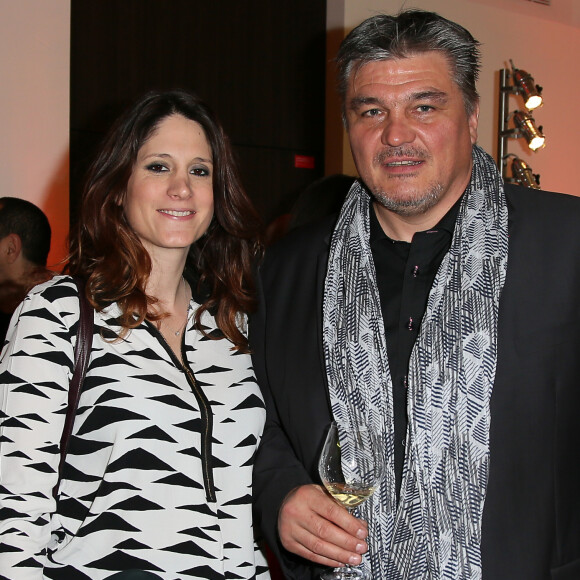 David Douillet avec Vanessa à la 1ère édition des "Plumes d'Or du Vin et de la Gastronomie" au Pavillon Vendôme à Paris, le 19 mai 2016.