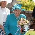La reine Elizabeth II lors d'une vente caritative au profit de l'église de Crathie, en Écosse, le 18 août 2019.