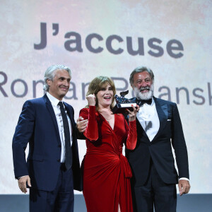 Alain Goldman, Emmanuelle Seigner (Grand Prix du Jury décerné à Roman Polanski pour "J'accuse"), Luca Barbareschi sur scène lors de la cérémonie de clôture du 76ème Festival International du Film de Venise (Mostra), le 7 septembre 2019.