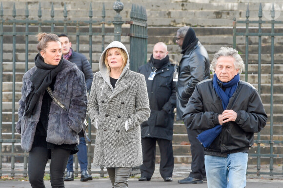 Emmanuelle Seigner et Roman Polanski avec leur fille Morgane lors des obsèques de Johnny Hallyday à Paris, le 9 décembre 2017. © Coadic Guirec/Bestimage