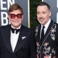 Elton John et son mari David Furnish - Photocall de la 77e cérémonie annuelle des Golden Globe Awards au Beverly Hilton Hotel à Los Angeles. Le 5 janvier 2020.