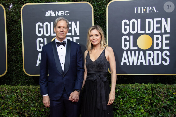 Michelle Pfeiffer et son mari David E. Kelley - Photocall de la 77e cérémonie annuelle des Golden Globe Awards au Beverly Hilton Hotel à Los Angeles. Le 5 janvier 2020.