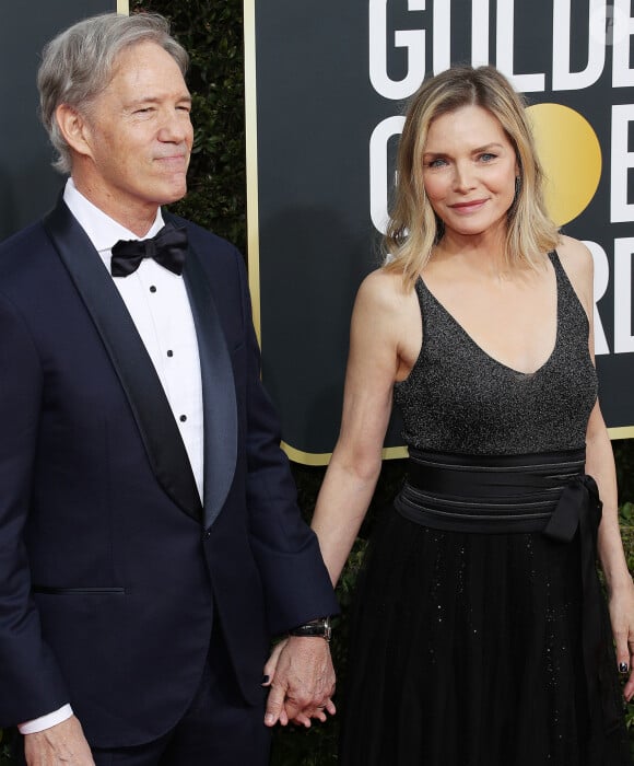 Michelle Pfeiffer et son mari David E. Kelley - Photocall de la 77e cérémonie annuelle des Golden Globe Awards au Beverly Hilton Hotel à Los Angeles, le 5 janvier 2020.