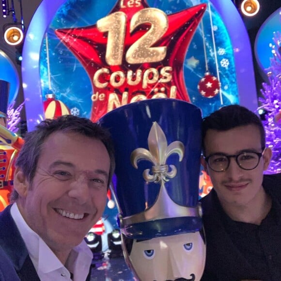 Jean-Luc Reichmann avec Paul des "12 Coups de midi", le 21 décembre 2019