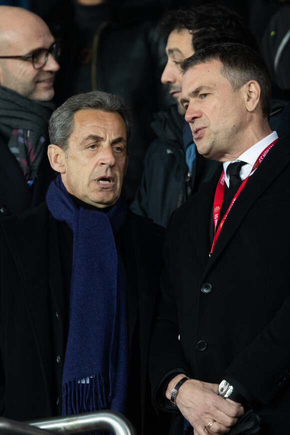 Nicolas Sarkozy et Oleg Petrov (vice président et directeur général de AS Monaco) dans les tribunes lors du match de Ligue 1 opposant le Paris Saint-Germain à l'AS Monaco au Parc des Princes à Paris, France, le 12 janvier 2020. Le PSG fait match nul face à l'AS Monaco (3-3).