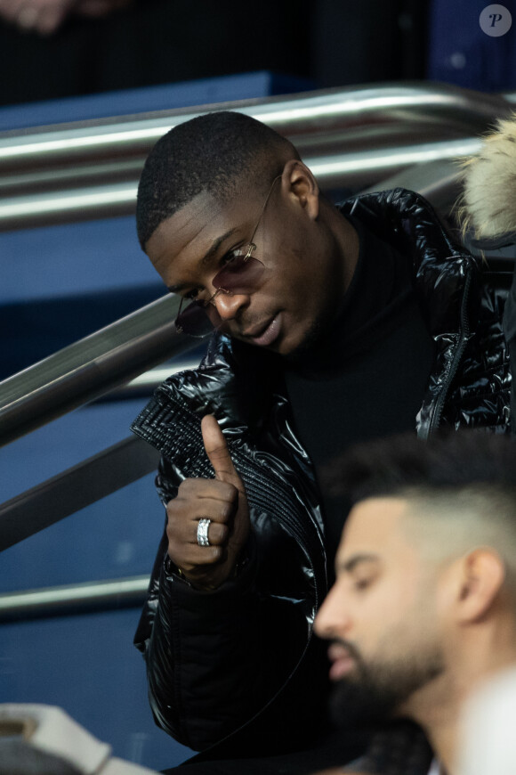 Le rappeur Ninho dans les tribunes lors du match de Ligue 1 opposant le Paris Saint-Germain à l'AS Monaco au Parc des Princes à Paris, France, le 12 janvier 2020. Le PSG fait match nul face à l'AS Monaco (3-3).