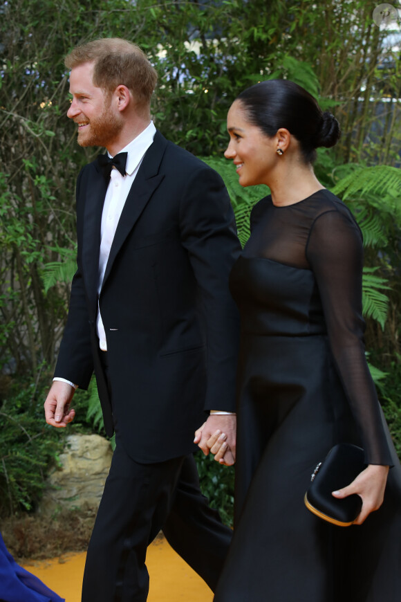 Le prince Harry, duc de Sussex, et Meghan Markle, duchesse de Sussex, à la première du film "Le Roi Lion" au cinéma Odeon Luxe Leicester Square à Londres, le 14 juillet 2019.