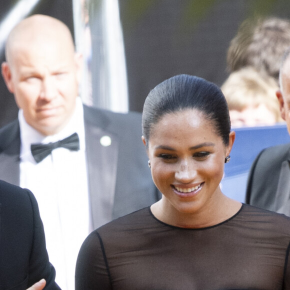 Le prince Harry, duc de Sussex, et Meghan Markle, duchesse de Sussex, à la première du film "Le Roi Lion" au cinéma Odeon Luxe Leicester Square à Londres, le 14 juillet 2019.