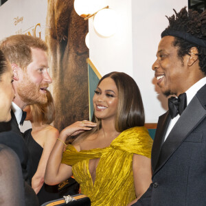 Le prince Harry, duc de Sussex, et Meghan Markle, duchesse de Sussex, avec Jay-Z et sa femme Beyonce Knowles à la première du film "Le Roi Lion" au cinéma Odeon Luxe Leicester Square à Londres, le 14 juillet 2019.