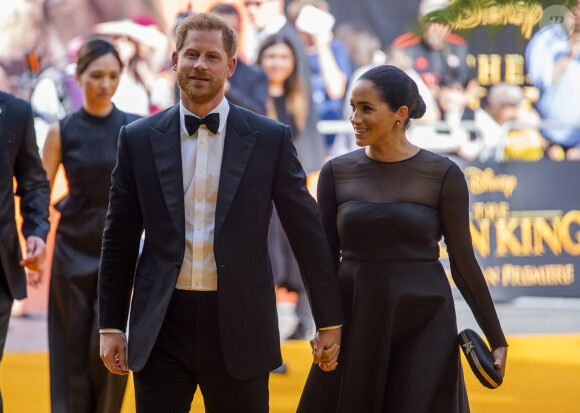 Le prince Harry, duc de Sussex, et Meghan Markle, duchesse de Sussex, à la première du film "Le Roi Lion" au cinéma Odeon Luxe Leicester Square à Londres, le 14 juillet 2019.
