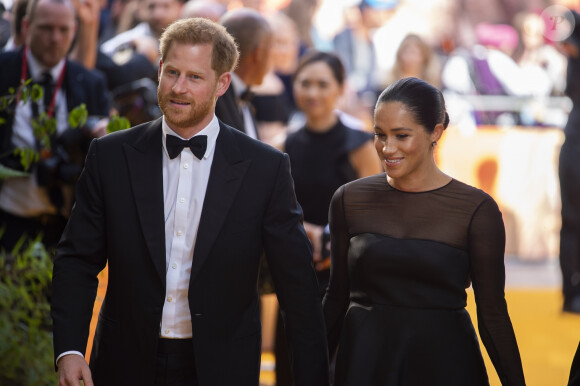 Le prince Harry, duc de Sussex, et Meghan Markle, duchesse de Sussex, à la première du film "Le Roi Lion" au cinéma Odeon Luxe Leicester Square à Londres, le 14 juillet 2019.