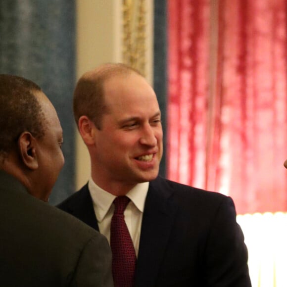 Le prince William, duc de Cambridge, et Kate Middleton, duchesse de Cambridge, accueillent les invités de la réception organisée pour le début du "Sommet Grande-Bretagne-Afrique sur les investissements" à Buckingham Palace, le 20 janvier 2020.