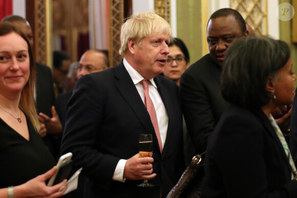 Le Premier ministre Boris Johnson - Le prince William, duc de Cambridge, et Kate Middleton, duchesse de Cambridge, accueillent les invités de la réception organisée pour le début du "Sommet Grande-Bretagne-Afrique sur les investissements" à Buckingham Palace, le 20 janvier 2020.