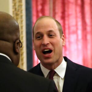 Le prince William, duc de Cambridge, et Kate Middleton, duchesse de Cambridge, accueillent les invités de la réception organisée pour le début du "Sommet Grande-Bretagne-Afrique sur les investissements" à Buckingham Palace, le 20 janvier 2020.