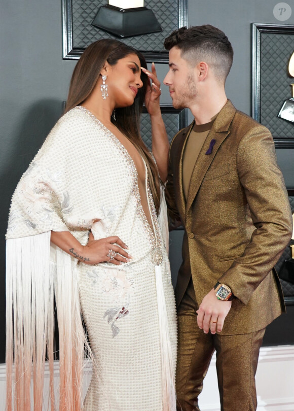 Priyanka Chopra Jonas et son mari Nick Jonas assistent à la 62ème soirée annuelle des Grammy Awards, au Staples Center. Los Angeles, le 26 janvier 2020.