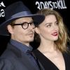 Johnny Depp et sa fiancée Amber Heard - Première du film "3 Days to Kill" à Hollywood, le 12 février 2014.