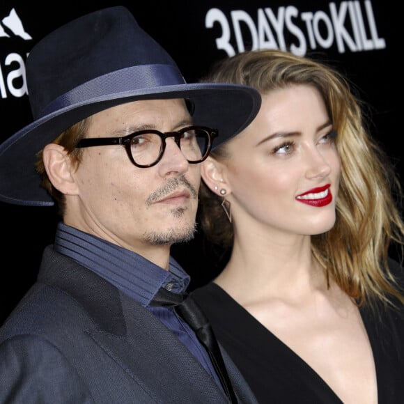 Johnny Depp et sa fiancée Amber Heard - Première du film "3 Days to Kill" à Hollywood, le 12 février 2014.