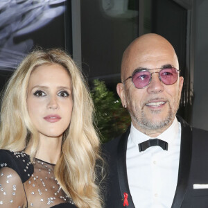 Pascal Obispo et sa femme Julie Hantson à la 17ème édition du "Dîner de la mode du Sidaction" au Pavillon d'Armenonville à Paris, France, le 24 janvier 2019. Depuis 2003, ce dîner permet de montrer l'engagement indéfectible du monde de la mode en faveur de la lutte contre le sida. © Olivier Borde/Bestimage