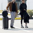 Exclusif - Tina Kunakey et son mari Vincent Cassel arrivent à l'aéroport de Milan lors de la Fashion Week (MLFW). A leur arrivée, un chauffeur vient les chercher en Maserati pour les emmener à leur hôtel. Milan, le 21 septembre 2018.