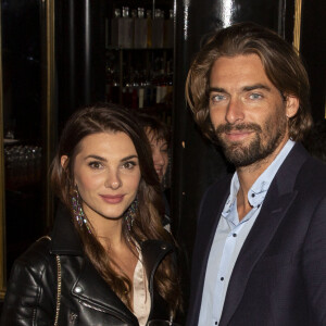 Camille Lacourt et sa compagne Alice Detollenaere (Miss Bourgogne 2010) lors de la soirée de lancement de la vodka "Touché" (vodka parisienne) au restaurant Castel à Paris, France, le 26 septembre 2019. © Jack Tribeca/Bestimage