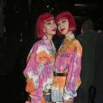Ami et Aya Suzuki au défilé Versace lors de la fashion week de Milan, le 21 février 2020.