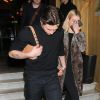 Exclusif - Brooklyn Beckham (le fils de David et Victoria Beckham) et sa petite amie Nicola Peltz sortent de l'hôtel Costes main dans la main à Paris, le 24 février 2020.