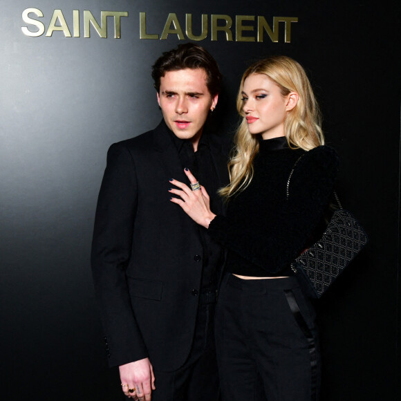 assistent au défilé de mode Saint Laurent, collection prêt-à-porter automne-hiver 2020/2021, à la Tour Eiffel. Paris, le 25 février 2020.