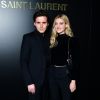 assistent au défilé de mode Saint Laurent, collection prêt-à-porter automne-hiver 2020/2021, à la Tour Eiffel. Paris, le 25 février 2020.