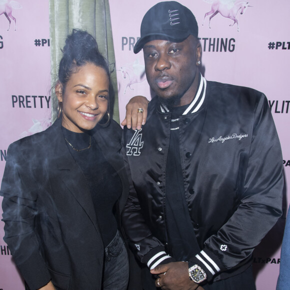 Exclusif - Christina Milian et Boss for Real lors de l'ouverture du tout nouveau showroom parisien PrettyLittleThing parrainée par Sananas, rue Saint-Florentin dans le 8ème arrondissement de Paris, France, le 3 mars 2020, en marge de la semaine de la mode de Paris. © Pierre Perusseau/Bestimage