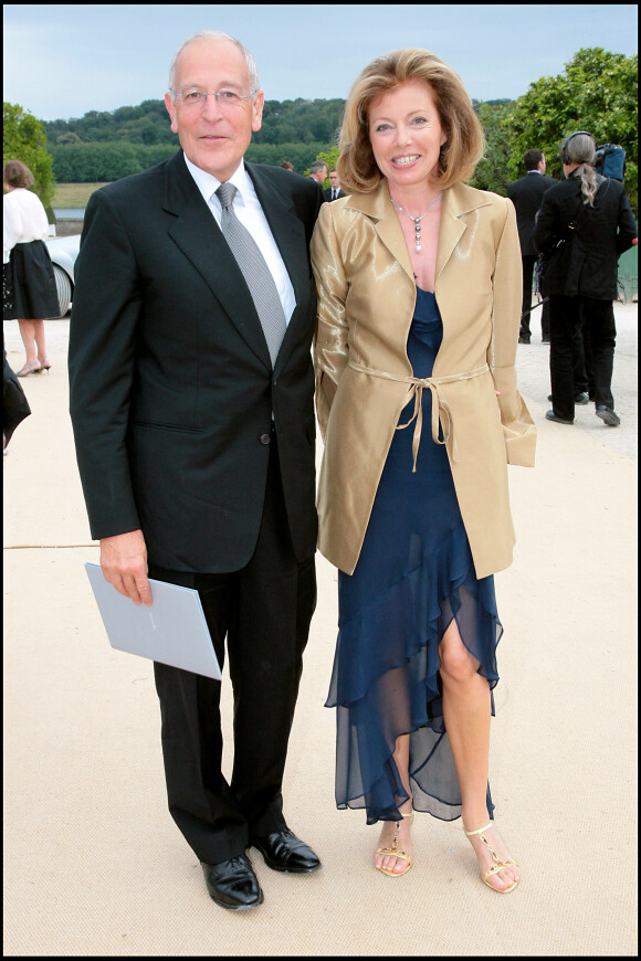Patrick Le Lay et sa femme Dominique à l'orangerie du Château de Versailles en juillet 2007 pour les 60 ans de Dior.