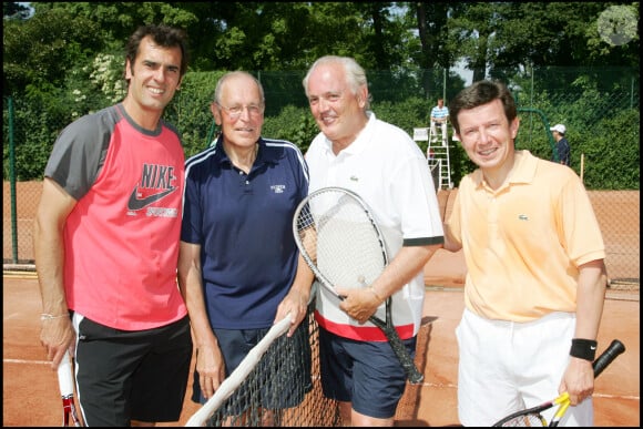Cédric Pioline, Patrick Le Lay, Christian Bîmes et Gilles Pelisson lors d'un tournoi de tennis en marge de Roland-Garros, en juin 2006.