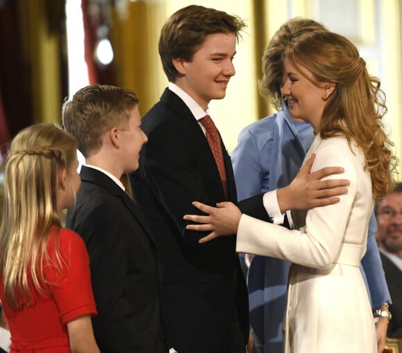 La princesse Elisabeth de Belgique, duchesse de Brabant, avec ses frères (Gabriel et Emmanuel) et sa soeur (Eléonore) lors de la célébration de son 18e anniversaire au palais royal à Bruxelles le 25 octobre 2019.