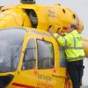 Le prince William lors de son premier jour en tant que pilote d'hélicoptère-ambulance au sein de l'organisme caritatif East Anglian Air Ambulance (EAAA) à l'aéroport de Cambridge, le 13 juillet 2015.
