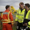 Le prince William lors de son dernier vol en hélicoptère pour l'East Anglian Air Ambulance à l'aéroport Marshall près de Cambridge, le 27 juillet 2017.