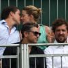Exclusive  - Amber Heard et son compagnon Vito Schnabel officialisent leur histoire d'amour avec un tendre baiser dans les tribunes de Wimbledon à Londres, le 7 juillet 2018.