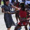 Meghan Markle (en robe Mayamiko) en visite dans le township de Nyanga, Afrique du Sud. Le 23 septembre 2019.