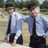 En France, les Frères Ennemis, Teddy Vrignault et André Gaillard déguisés en gendarmes lors de "Cocktail maison" le 12 juillet 1984.