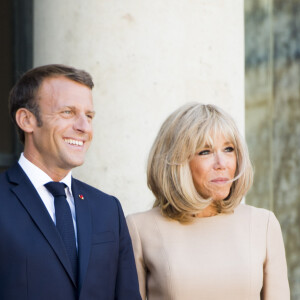 Le président Emmanuel Macron et la première dame Brigitte Macron - Le président de la République française reçoit le premier ministre de la République Hellénique au palais de l'Elysée à Paris le 22 août 2019. © JB Autissier / Panoramic / Bestimage