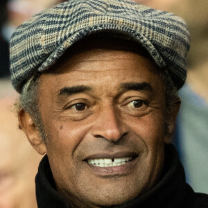 Yannick Noah - People dans les tribunes du match de football de Ligue 1 "PSG-Lyon" à Paris. Le 9 février 2020.