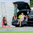 Catherine (Kate) Middleton, duchesse de Cambridge avec ses enfants, le prince George de Cambridge, la princesse Charlotte de Cambridge et le prince Louis de Cambridge lors d'un match de polo de bienfaisance King Power Royal Charity Polo Day à Wokinghan, comté de Berkshire, Royaume Uni, le 10 juillet 2019.