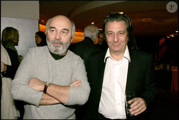 Christian Clavier et Gérard Jugnot lors de la projection des "Bronzés 3" à Paris en 2006.