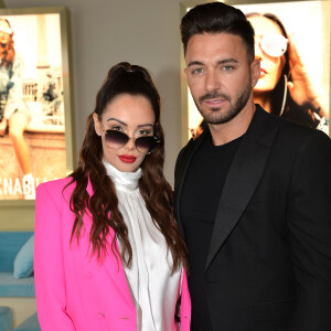 Nabilla Benattia (enceinte) et son mari Thomas Vergara - Nabilla Benattia présente sa collaboration pour les lunettes Quay Australia sur la plage Magnun lors du 72ème Festival International du Film de Cannes, le 18 mai 2019. ©Veeren / Bestimage