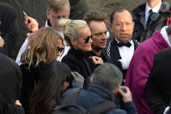 Laeticia Hallyday, ses filles Joy et Jade, Laura Smet, David Hallyday - Sorties de l'église de la Madeleine après les obsèques de Johnny Hallyday à Paris le 9 décembre 2017. © Veeren / Bestimage