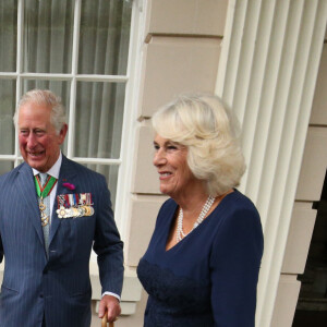 Le prince Charles, prince de Galles, et Camilla Parker Bowles, duchesse de Cornouailles accueillent le président de la République française Emmanuel Macron dans la maison royale Clarence House, pour la commémoration du 80ème anniversaire de l'appel du 18 juin du général de Gaulle à Londres, Royaume Uni, le 18 juin 2010.