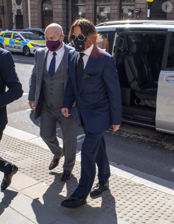 Johnny Depp arrive à la cour royale de justice à Londres, pour entamer le procès pour diffamation contre le magazine The Sun Newspaper. Le 7 juillet 2020