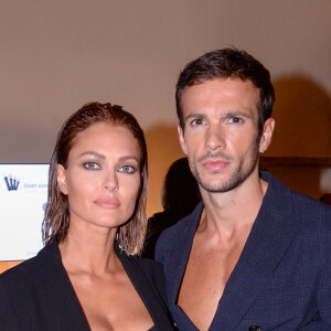 Exclusif - Caroline Receveur et son compagnon Hugo Philip - Les people dans l'espace Experience Immersive réservé aux VIP lors du Etam Live Show 2019 au Stade Roland Garros lors de la fashion week à Paris, le 24 septembre 2019. © Rachid Bellak/Bestimage