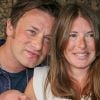 Jamie Oliver et sa femme Jools présentent leur 5ème enfant , un garçon, en sortant de l'hôpital Portland à Londres, le 8 août 2016 en présence de leurs enfants Poppy Honey (14 ans), Daisy Boo (12 ans), Petal Blossom (6 ans) et Buddy Bear (5 ans).