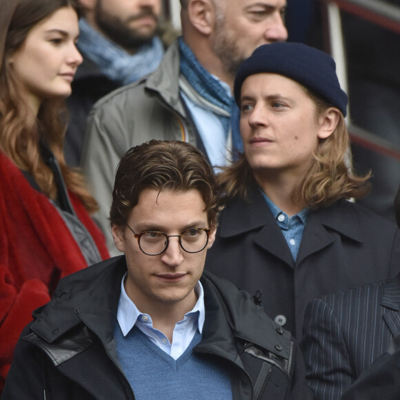 Jean Sarkozy avec son fils Solal et Pierre Sarkozy - Célébrités dans les tribunes du parc des princes lors du match de football de ligue 1 PSG-Bastia le 6 mai 2017.