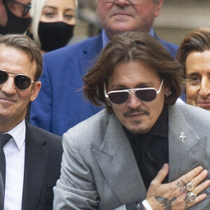 Johnny Depp à la sortie de la cour royale de justice de Londres, au dernier jour du procès en diffamation contre le magazine The Sun Newspaper. Le 28 juillet 2020.